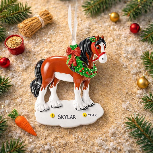 Horse-shaped Christmas ornament with a wreath and 'custom' text, surrounded by festive decorations.