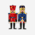 Load image into Gallery viewer, Festive close up of a personalized nutcracker couple ornament featuring two classic nutcracker figures in red and blue uniforms with custom name details. Designed for couples, partners, siblings, or loved ones, this ornament symbolizes balance, tradition, and togetherness. A timeless Christmas keepsake ideal for tree decor, holiday gifting, and celebrating meaningful bonds.

