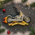 Load image into Gallery viewer, Motorcycle ornament with flames on a textured surface with Christmas decorations
