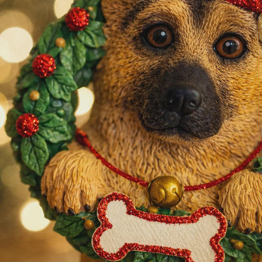 Dog-shaped ornament with a wreath and bone decoration on a blurred lights background