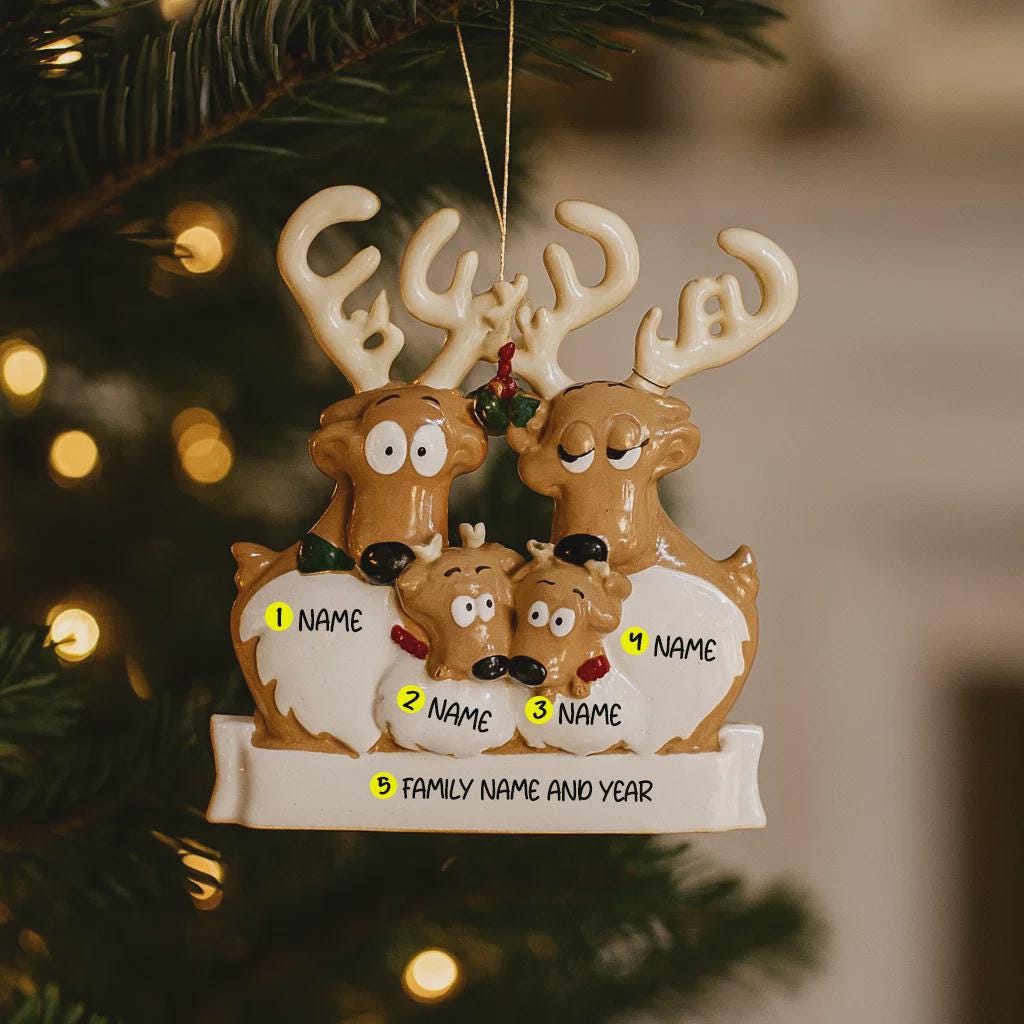 Reindeer family ornament with customizable names on a Christmas tree.