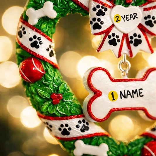 Decorative wreath ornament with customizable name tag on a blurred light background