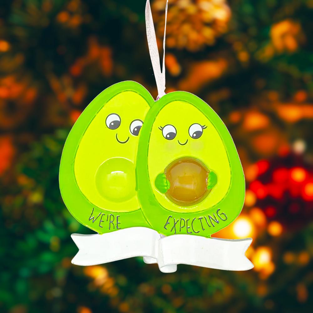 Personalized expecting couple ornament featuring a cute avocado couple design celebrating pregnancy and growing families. This joyful Christmas ornament can be customized with two names and a year, making it perfect for pregnancy announcements, expecting parents, baby reveals, and first Christmas as a family. A playful and heartwarming keepsake that captures love, excitement, and the beginning of a beautiful new chapter together.