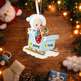 Load image into Gallery viewer, Personalized baby first Christmas ornament featuring a sweet baby boy sitting in a pastel blue sleigh holding a small teddy bear. Handwritten baby name and year displayed on the sleigh front. Smooth resin finish with soft winter tones, lightweight structure, mostly 2D ornament with raised 3D front details, designed for baby boy nursery themed Christmas tree decor and keepsake gifting.
