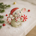Load image into Gallery viewer, Decorative figurine of a mouse in a Santa hat with candy canes on a snowy surface.
