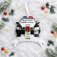 Load image into Gallery viewer, Personalized police car Christmas ornament featuring a black and white cop car design with BUSTED text, police lights and festive wreath detail. Customized with a name and year on the front banner. Glossy resin finish with bold black and white colors creates a fun and playful holiday look. Mostly 2D ornament with raised 3D details on the front only, lightweight and perfect for Christmas tree decor and police themed gifts.
