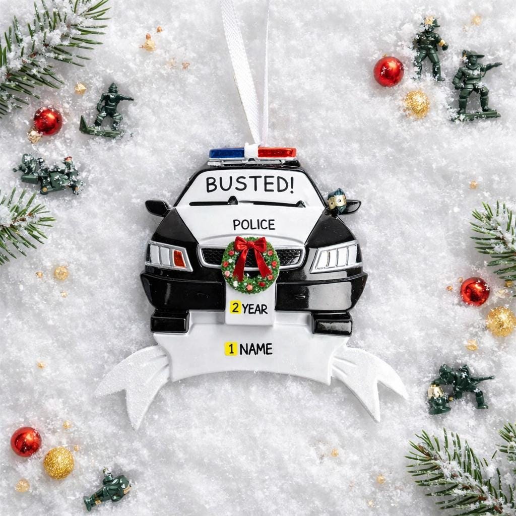 Personalized police car Christmas ornament featuring a black and white cop car design with BUSTED text, police lights and festive wreath detail. Customized with a name and year on the front banner. Glossy resin finish with bold black and white colors creates a fun and playful holiday look. Mostly 2D ornament with raised 3D details on the front only, lightweight and perfect for Christmas tree decor and police themed gifts.
