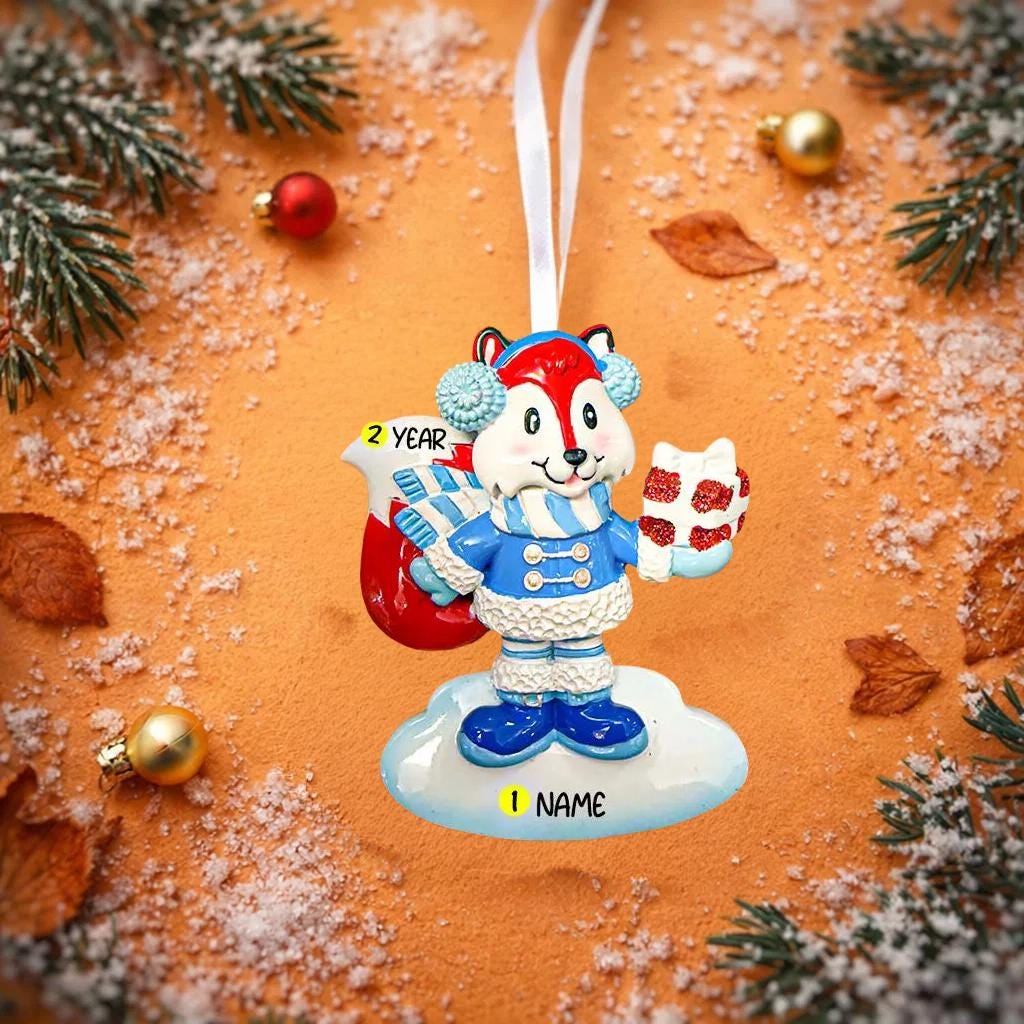 Decorative Christmas ornament with a character fox holding a candy cane on a snowy background.