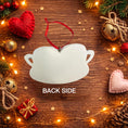 Load image into Gallery viewer, Decorative white teapot ornament on a wooden surface with Christmas decorations.
