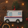 Load image into Gallery viewer, Decorative model of a mail truck with Christmas decorations on a wooden surface
