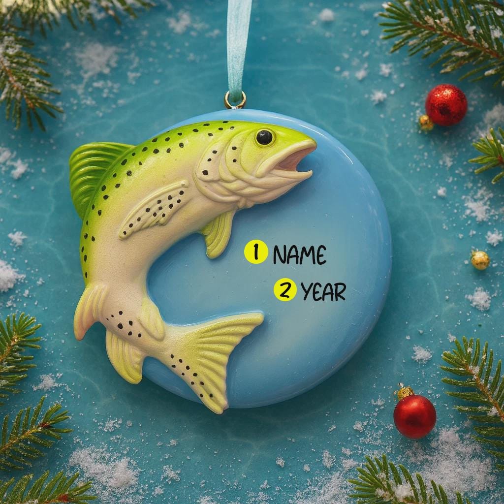 Trout Fish-shaped ornament with customizable name and year on a blue background with Christmas decorations.