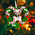 Load image into Gallery viewer, Heart-shaped Christmas wreath ornament with customizable name tag on a blurred festive background
