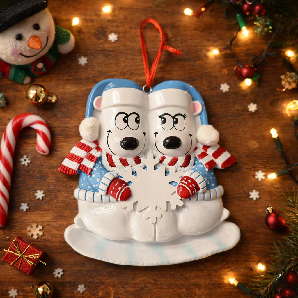 Decorative ornament of two polar bears in love with scarves on a wooden background with Christmas decorations.