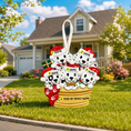 Load image into Gallery viewer, Decorative ornament with dalmatian dogs in Santa hats on a grassy lawn with a house in the background.

