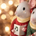 Load image into Gallery viewer, Decorative mouse figurine in a red sweater with music notes, against a blurred light background.
