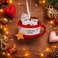 Load image into Gallery viewer, Personalized couple ornament featuring two smiling characters inside a cozy holiday mug design. This romantic Christmas ornament can be customized with two names and a family name or year, making it perfect for couples, partners, spouses, fiancés, or loved ones. Ideal for celebrating love, Valentine’s Day, anniversaries, newlyweds, or first holidays together. A warm and meaningful keepsake that captures shared moments and turns them into lasting holiday memories.

