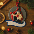 Load image into Gallery viewer, Decorative boxing glove ornament on a wooden surface with Christmas decorations.
