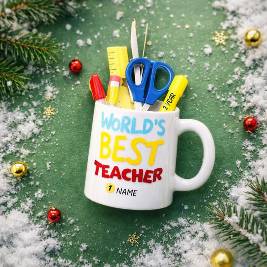 Personalized teacher ornament designed as a white mug filled with classroom tools including scissors ruler pencil and marker. The front reads Worlds Best Teacher with custom name personalization. Mostly 2D design with raised 3D tool details. A perfect Christmas ornament gift for teachers educators and school staff.