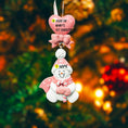 Load image into Gallery viewer, Personalized pink snowman baby Christmas ornament with custom name and year, 3D raised front design, baby girl first Christmas keepsake decoration
