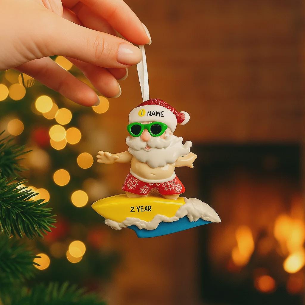 Personalized surfing Santa Christmas ornament featuring a fun beach themed Santa riding a wave on a surfboard. Raised 3D front details add depth while the back remains flat for easy hanging. Custom name and year placement make this ornament a playful and unique holiday keepsake for Christmas tree decor.