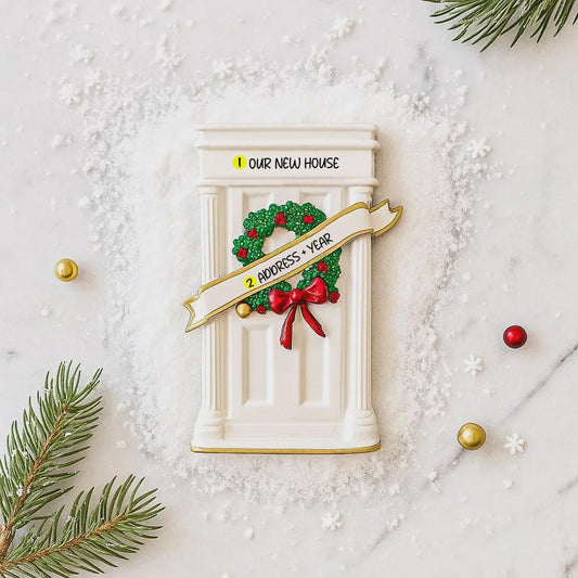 Decorative door with wreath and text on a snowy background