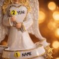 Load image into Gallery viewer, Decorative angel figurine holding a heart with '2 Year' text, against a blurred golden background.
