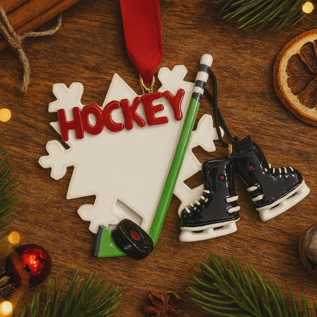 Hockey-themed Christmas ornament with skates and stick on a wooden surface.