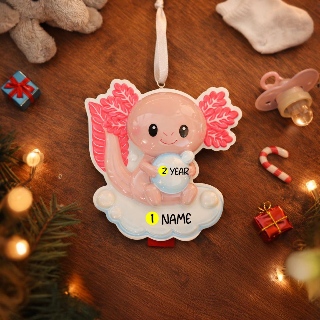 Decorative baby ornament with wings on a wooden surface surrounded by Christmas decorations.