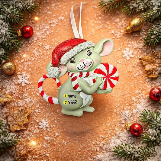 Decorative Christmas ornament of a mouse holding a candy cane with customizable name and year on a festive background.
