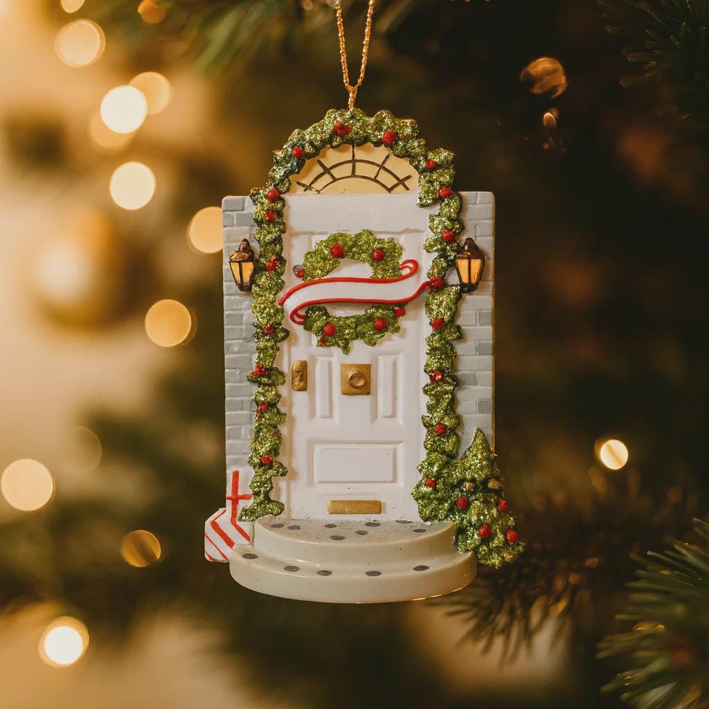 Decorative Christmas ornament of a door with wreath and lights on a blurred Christmas tree background.