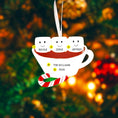Load image into Gallery viewer, Decorative Christmas ornament shaped like a teacup with marshmallows and candy cane, against a festive background.
