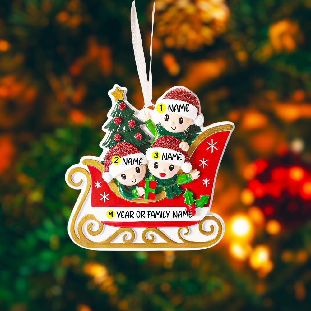 Personalized Christmas ornament with three children in a sleigh and a tree, against a festive background.