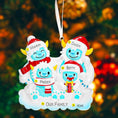 Load image into Gallery viewer, Personalized family ornament with 'Mamma', 'Daddy', 'Betty', and 'Freddy' on a festive background.
