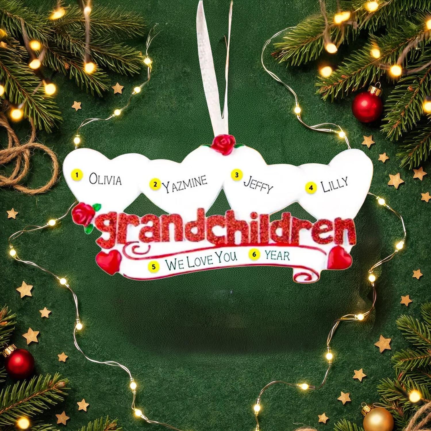 Personalized grandchildren ornament with names on a green background with Christmas decorations