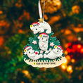 Load image into Gallery viewer, Decorative ornament with seals on a tree, personalized with names and year.
