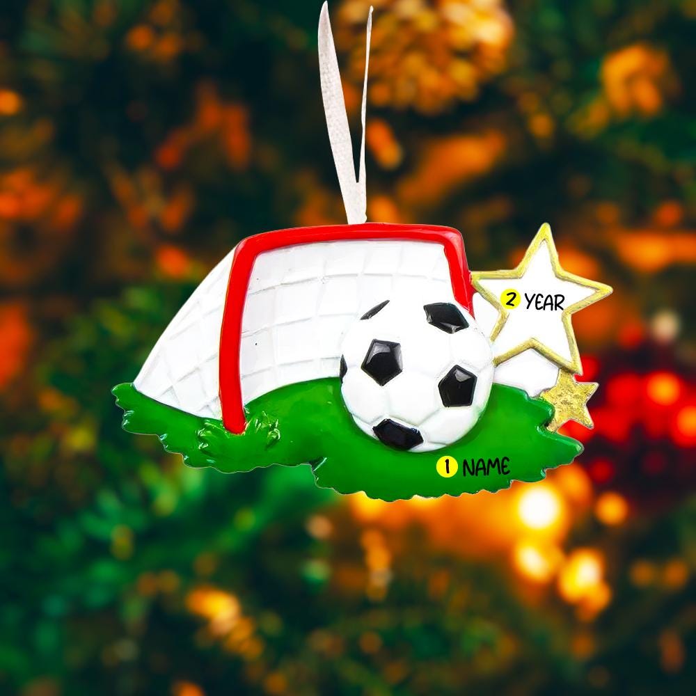 Personalized soccer ornament featuring a detailed goal and ball design with a glossy finish and raised 3D details. The ornament includes one custom name and year displayed on the front. Styled with festive lighting and greenery, this sports themed ornament is perfect for soccer lovers, players, and coaches. Designed with a 3D front and flat back, lightweight and easy to hang on a Christmas tree or display year round.
