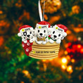 Load image into Gallery viewer, Personalized Christmas ornament with three Dalmatians in a basket, against a festive background.
