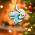 Load image into Gallery viewer, Decorative ornament with a blue dinosaur and unicorn design on a Christmas tree.
