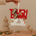 Load image into Gallery viewer, Decorative ornament with 'Touch down' text and football elements on a beige background
