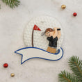 Load image into Gallery viewer, Golf-themed Christmas ornament with a golfer and flag on a snowy background
