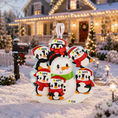 Load image into Gallery viewer, Decorative Christmas ornament with a snowman and penguins in front of a snow-covered house with Christmas lights.
