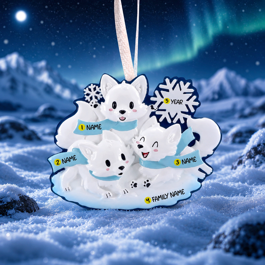 Decorative ornament with three white dogs on a snowy background