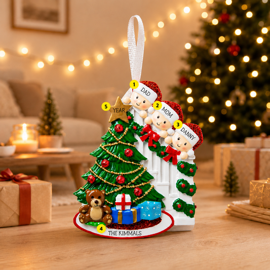 Personalized Christmas ornament with family members around a Christmas tree in a festive living room.
