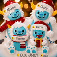 Load image into Gallery viewer, Christmas-themed family ornament with four characters labeled Mamma, Daddy, Freddy, and Betty against a blurred festive background.
