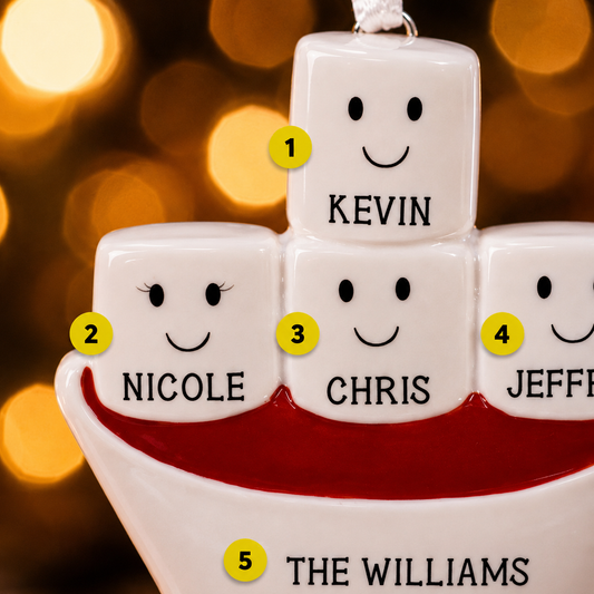 Personalized Christmas ornament with names on dice against a blurred light background
