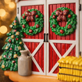 Load image into Gallery viewer, Decorative Christmas scene with red barn doors, green wreaths, a tree, and a milk jug.
