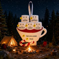 Load image into Gallery viewer, Personalized Christmas ornament shaped like a teacup with names against a camping background.
