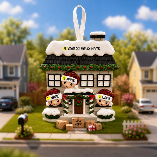 Decorative house ornament with three figures in front of a suburban neighborhood.