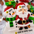 Load image into Gallery viewer, Personalized Christmas ornament with Santa Claus and snowman, ready for name customization.

