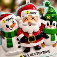 Load image into Gallery viewer, Decorative Christmas ornament with Santa Claus, snowman, and penguin, each with 'NAME' labels.
